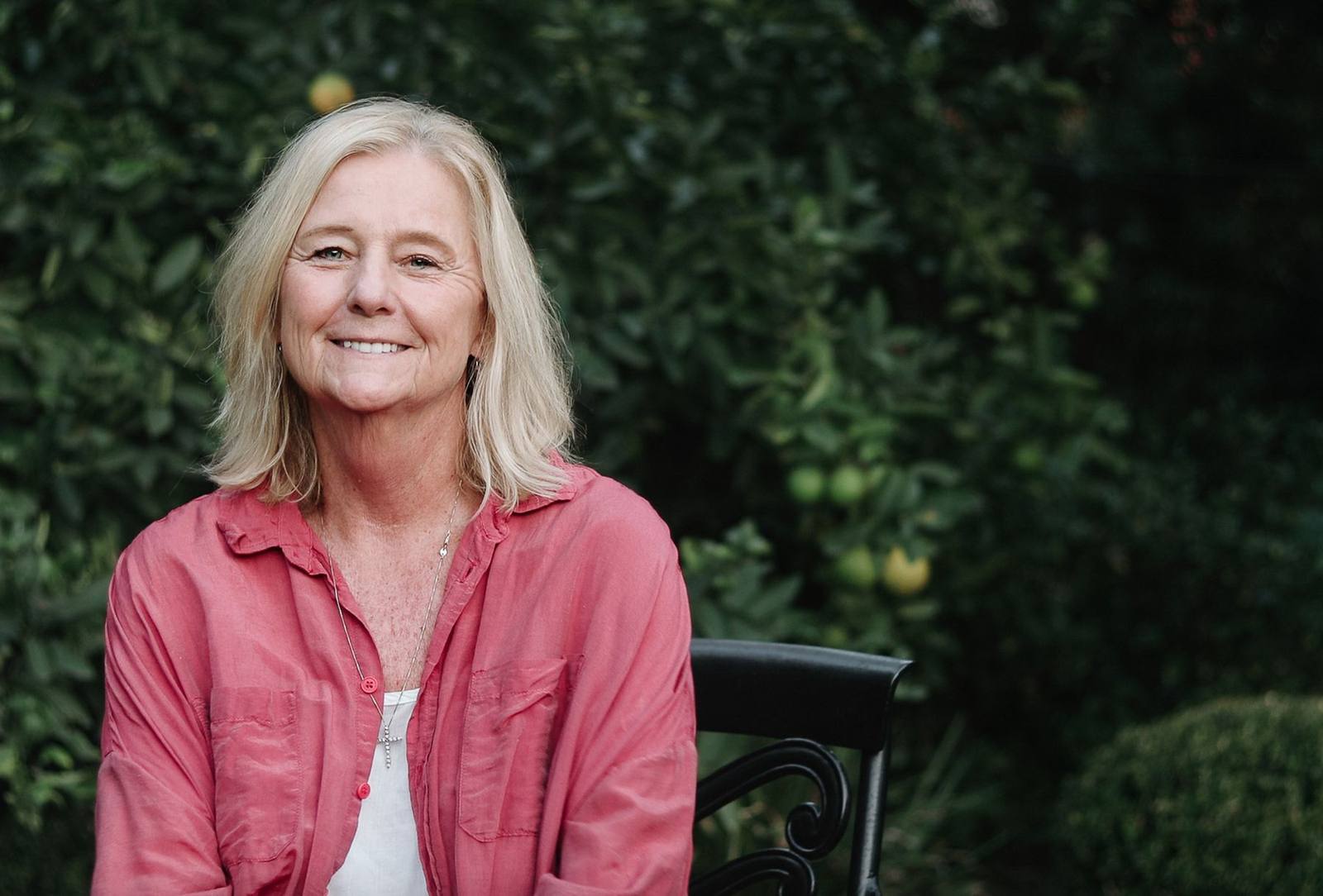 Dr. Karen Bergstrom seated in her garden